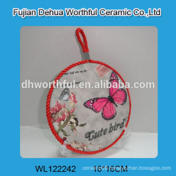 Beautiful butterfly of ceramic pot holder with red rope